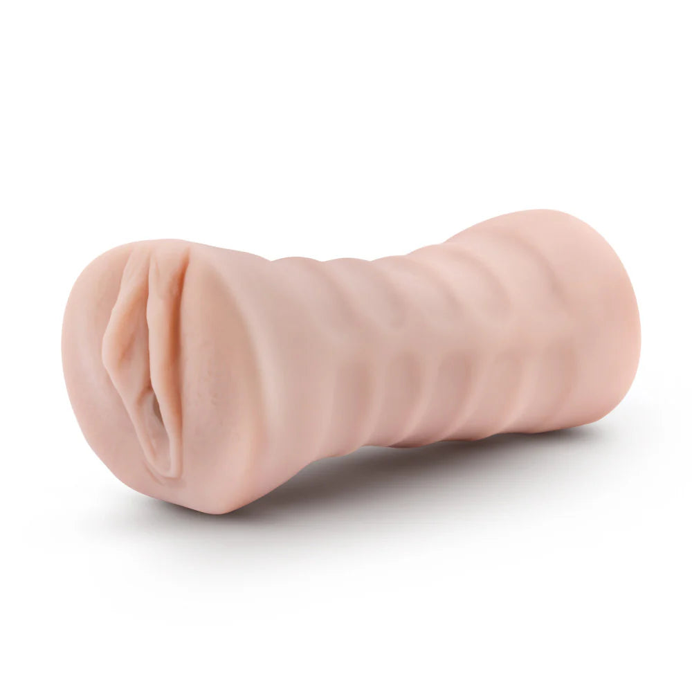 A side view of the Blush Rain with Vibrator showcases the textured design that makes it easier to grip during use. | Kinkly Shop