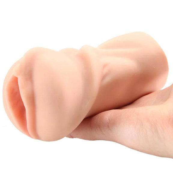 A person's outstretched palm. The Angela White Pussy stroker is resting on it. It looks somewhat small on the person's palm. | Kinkly Shop