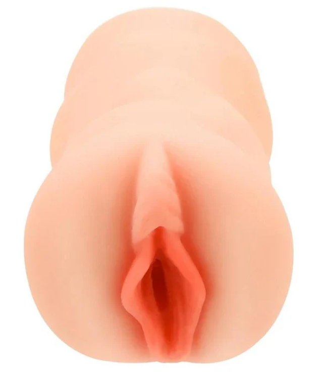 Close-up of the orifice and entrance of the Gia Derza Pussy stroker. It has visible inner labia. | Kinkly Shop
