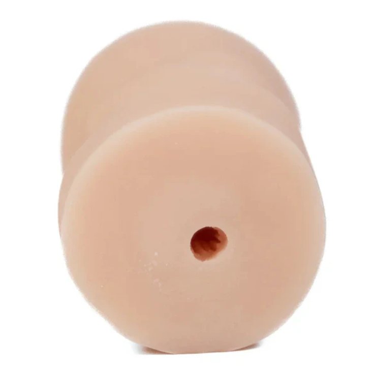 Backside of the Jada Stevens Pussy that showcases the open exit hole on the side of the stroker opposite the vulva. | Kinkly Shop