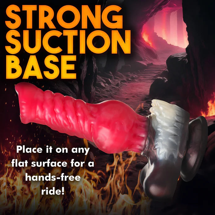 The Creature Cocks Cujo shown suction cupped to a vertical surface. Text on the image reads: Strong suction base. Place it on any flat surface for a hands-free ride. | Kinkly Shop