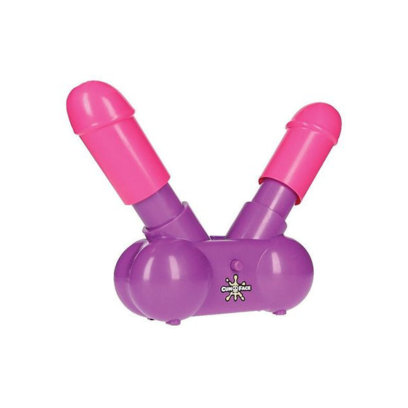 The Cum Face Game up against a white background. The base of the game is purple, and it has two pink "penises" protruding at a 45-degree angle. The pink penises can be pumped up and down on the plastic purple base. | Kinkly Shop
