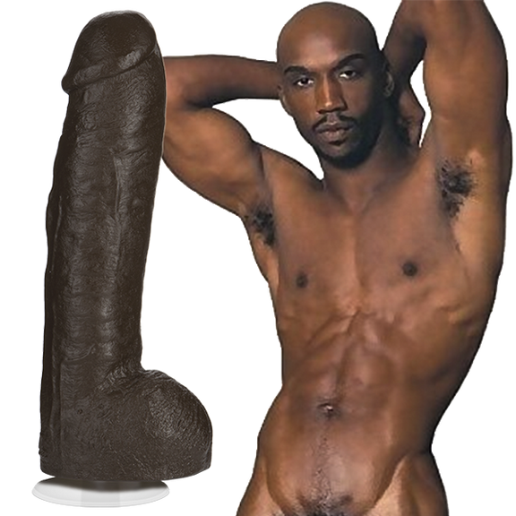 Bam is naked and looking into the camera. The Signature Cocks PVC - Bam dildo is shown next to Bam, a direct replica of the porn star's shaft. | Kinkly Shop