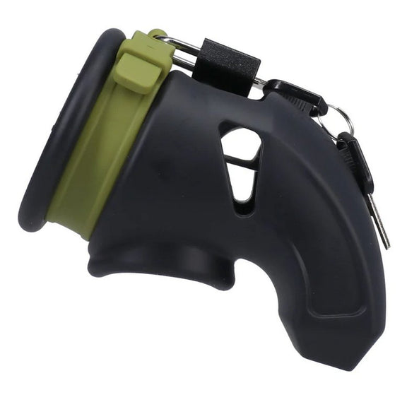 A side view of the Fort Troff CUMfort Cage. The entirety of the cage is black silicone. A green silicone loop wraps around the base, underneath the testicles, to secure the cage around the package. | Kinkly Shop