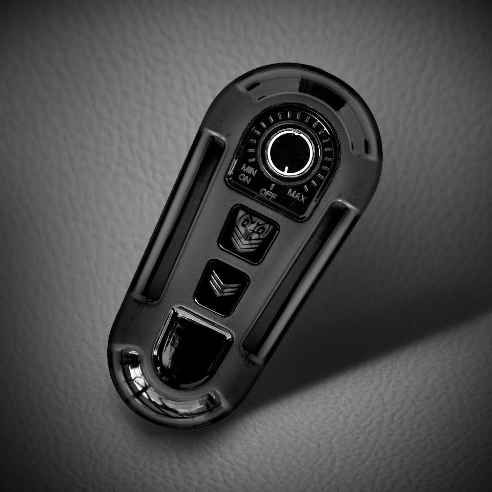 Close-up of the remote control for the Fort Troff Gunner System. There's a turn dial and multiple buttons on its oval-shaped design that makes for easy grasping. | Kinkly Shop