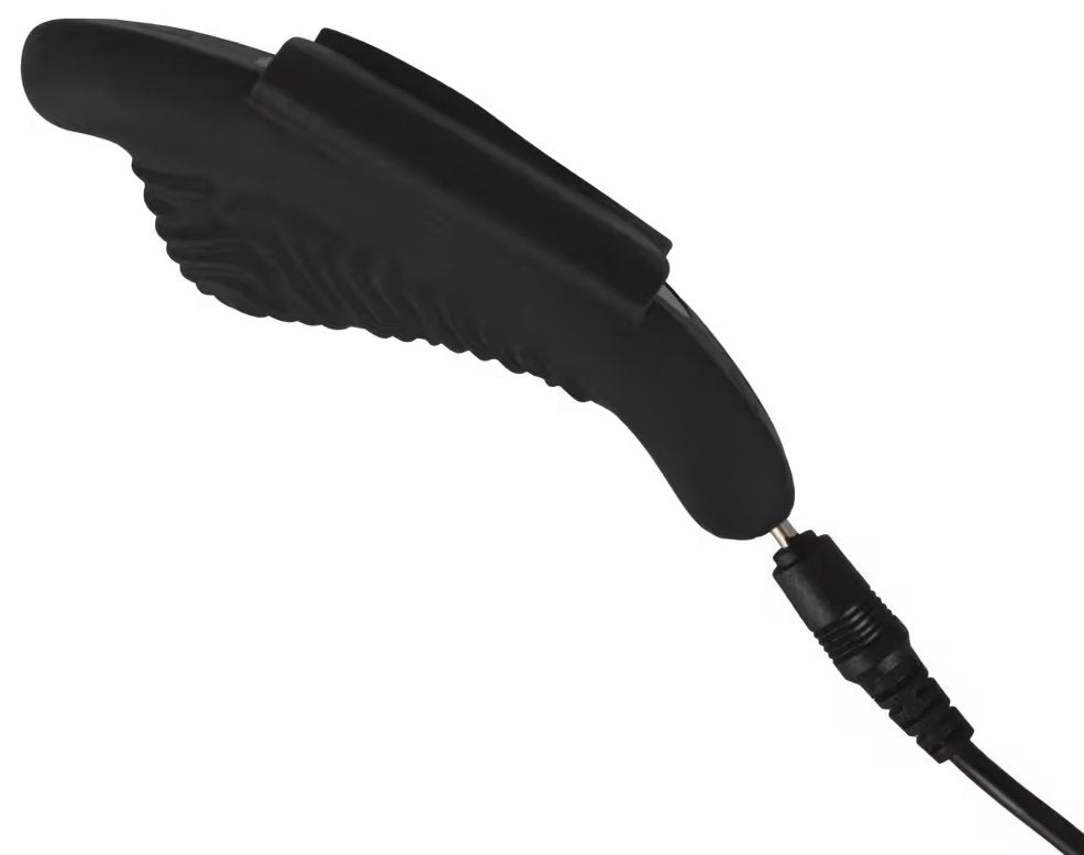 The base of the GoGasm Panty Vibrator is plugged into its charging cable. | Kinkly Shop