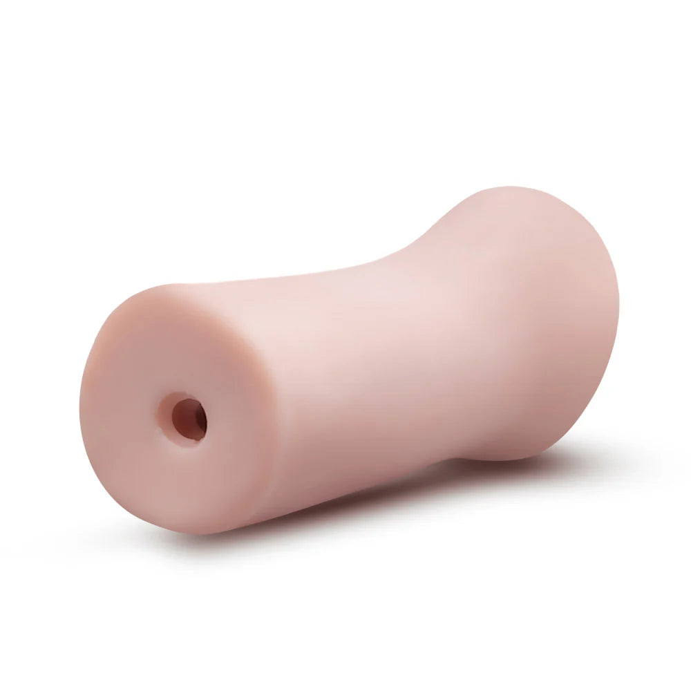 Blush Jasmine's Hot Mouth with the "end" of the stroker facing the camera showing the open-ended design that allows the stroker to work for all sizes and for easy cleaning. | Kinkly Shop