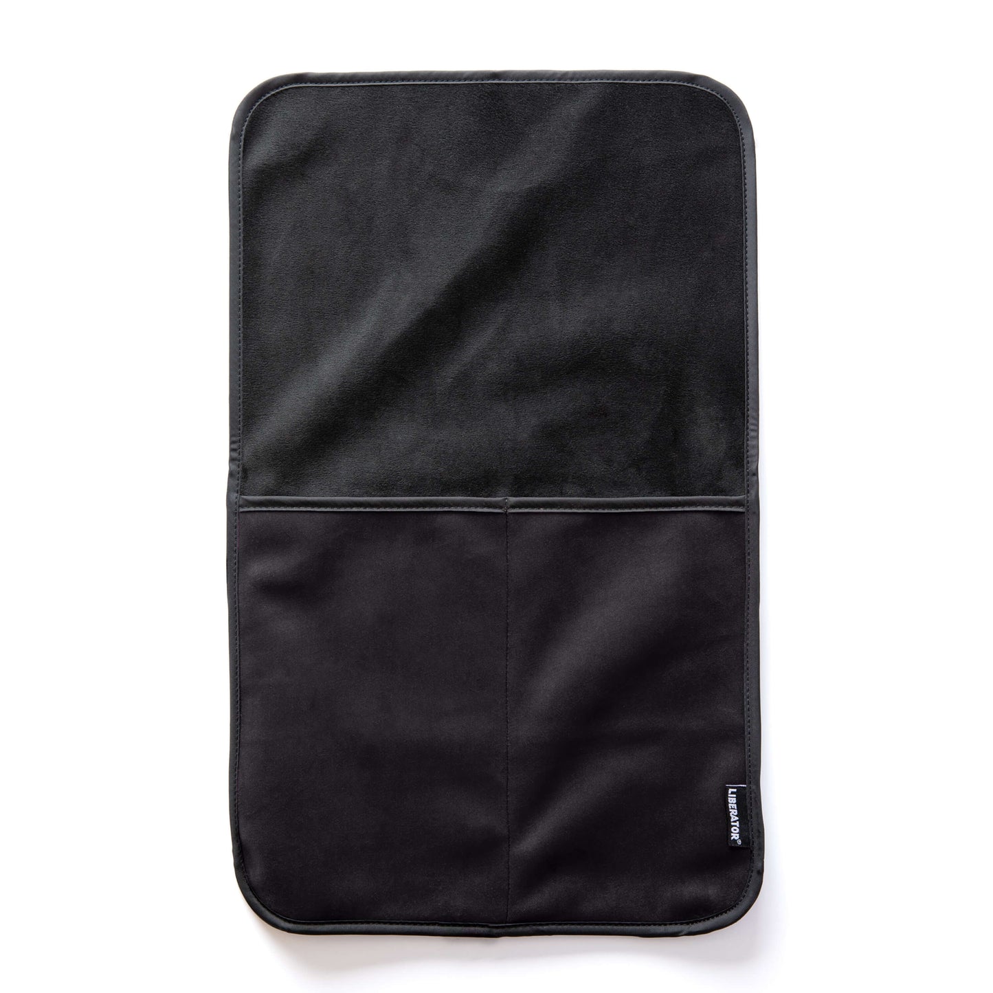 The Liberator Fascinator Sex Toy Caddy in Black laying flat on a white surface. There are two deep pockets sewn into the base of the Caddy with a long, flat surface on top that can be tucked underneath any heavy objects. | Kinkly Shop