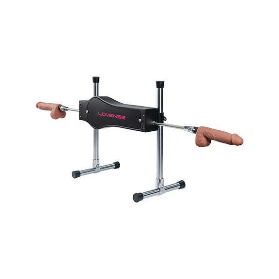 The Lovense Sex Machine in front of a white background shown with both rods and dildos attached to both sides of the machine. It could thrust into two different people at once. | Kinkly Shop