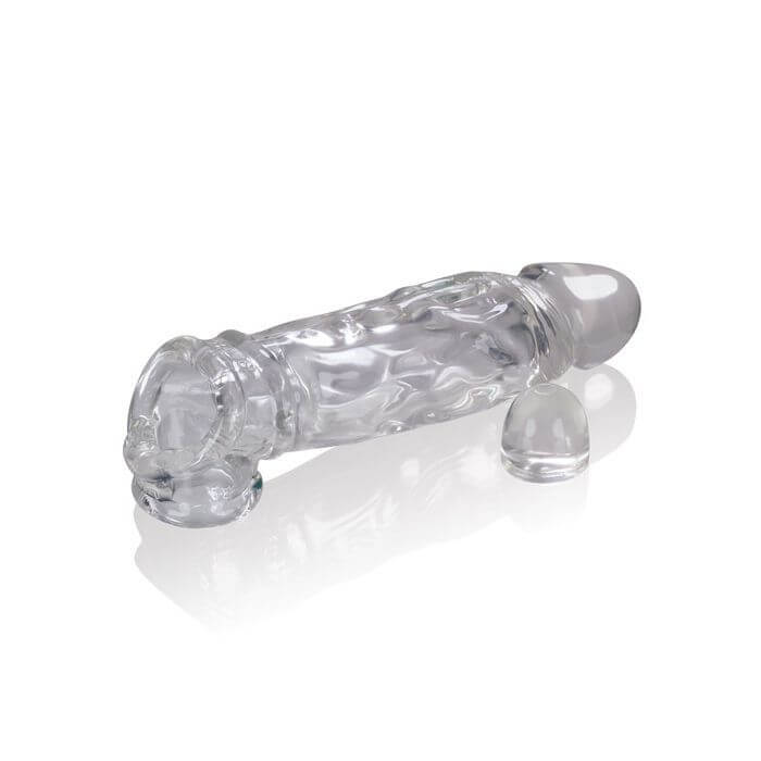 The Oxballs Butch for Shorter Shafts sitting out in front of an Adjust-Fit insert that can be slid inside of the extender's interior chamber to shorten the "usable" room of the extender to work for even more shaft sizes. | Kinkly Shop