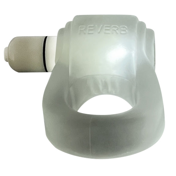 The Oxballs Glowdick in Clear Ice color. The LED light inside of the cock ring is lid up, showing a bright white light through the surface of the cock ring. | Kinkly Shop