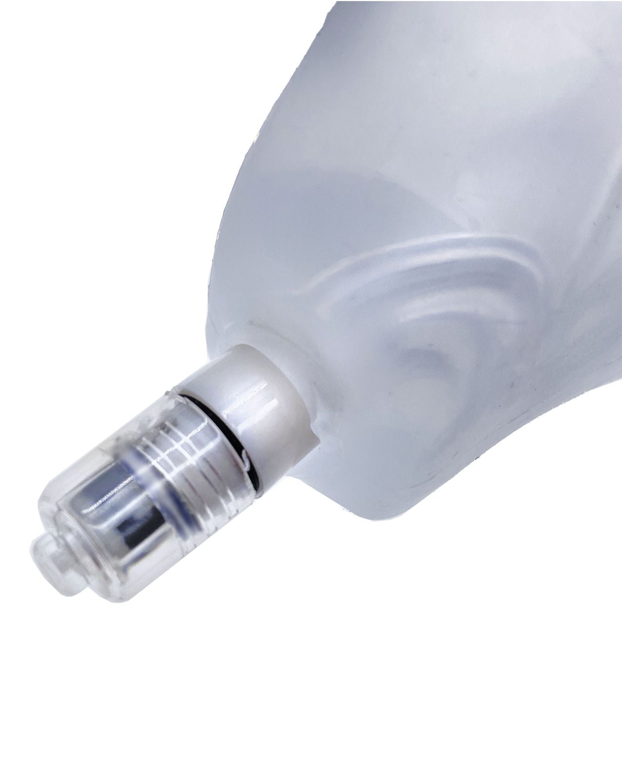 The LED light shown at the base of the Oxballs Glowhole. It's slowly being removed from the toy, showcasing that the Glowhole can be used without the LED light, if desired, as well. | Kinkly Shop