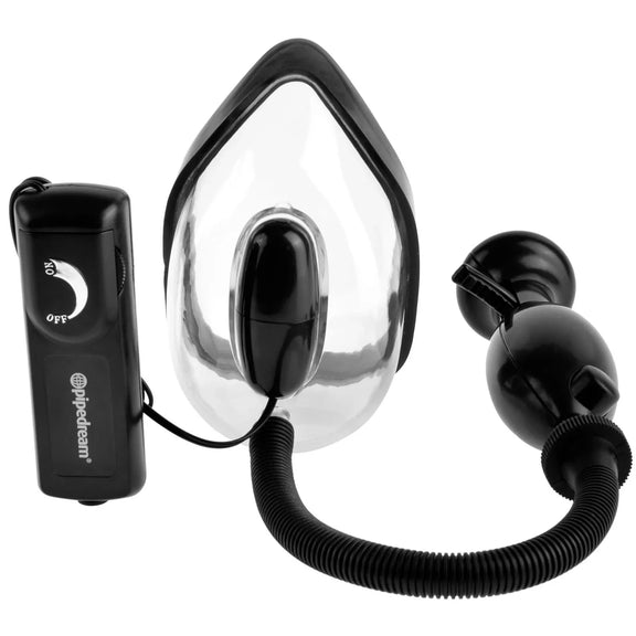 The Fetish Fantasy Extreme Vibrating Pussy Pump in front of a plain white background. The pump has the cup itself, the inflation bulb, and the wired remote control for the bullet vibrator attached to the cup. | Kinkly Shop