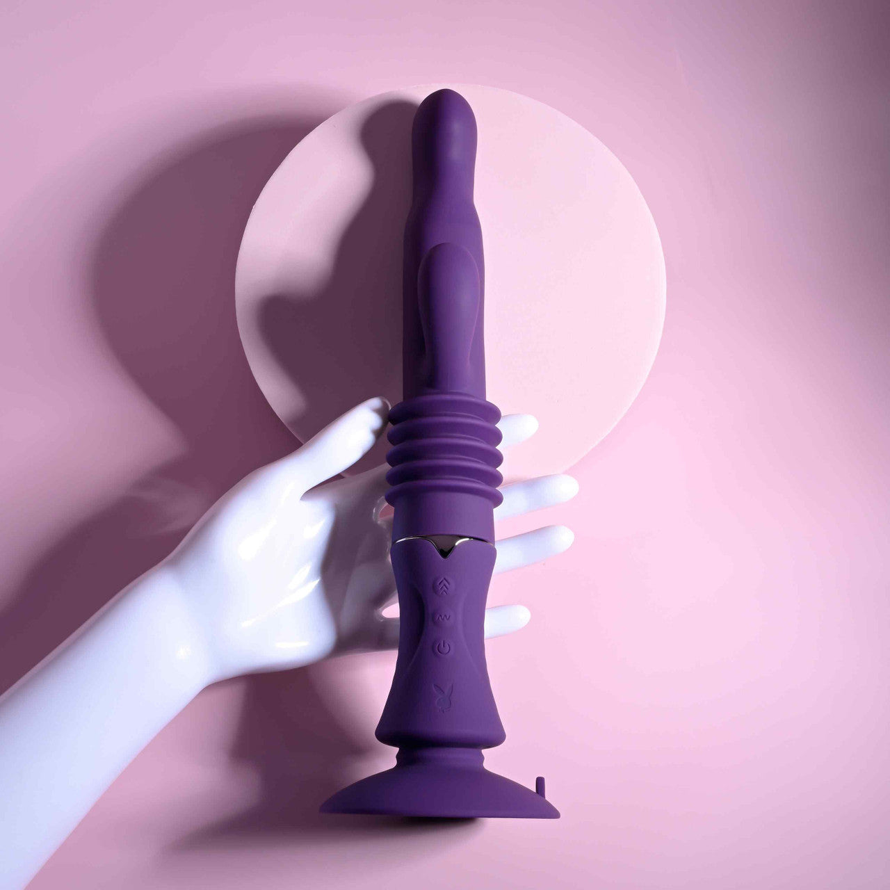 A mannequin hand holds the Playboy Hoppy Ending. The vibrator is much, much longer than their hand. | KInkly Shop