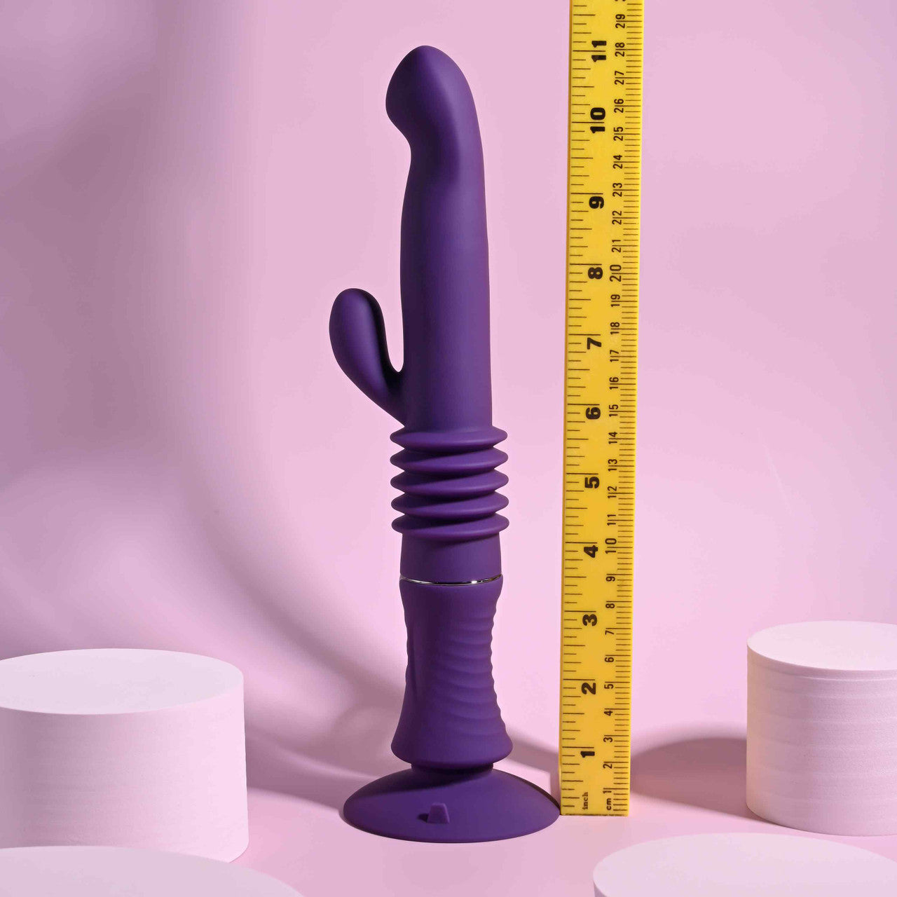 The Playboy Hoppy Ending shown next to a yellow measuring tape. The vibrator is 11" in total length. | Kinkly Shop
