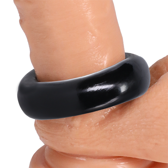 The Rock Solid The Donut 4X shown wrapped around the base of a realistic dildo | Kinkly Shop