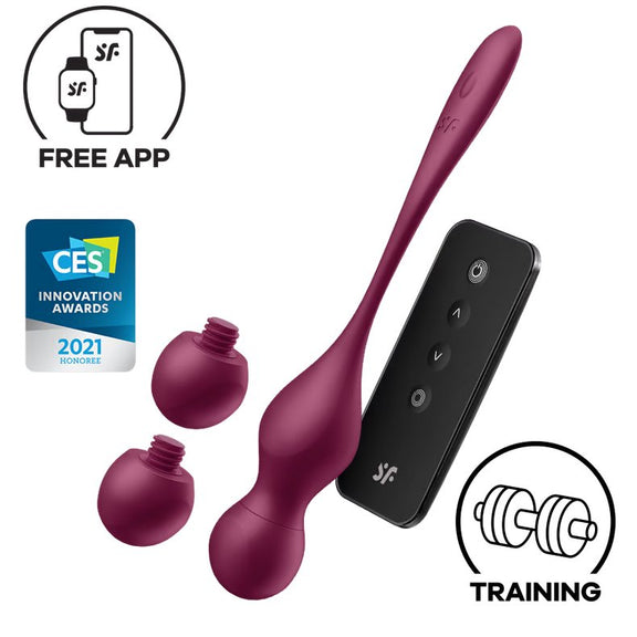 The Satisfyer Love Birds Vary with the physical remote shown next to its interchangeable heads too. Icons next to the toy showcase it's free app, kegel training design, and the 2021 Honoree CES Innovation Award s| Kinkly Shop