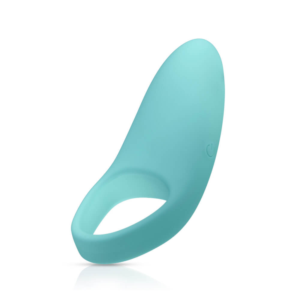 The SELF + Jimmyjane Vibrating C-Ring against a white background. The power button can be seen in this view. The vibrator portion protrudes really far away from the ring itself. | Kinkly Shop