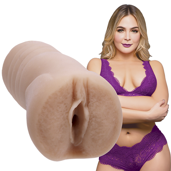 Blair Williams looks into the camera while wearing lingerie. The Signature Strokers Blair Williams stroker is shown next to the porn star. | Kinkly Shop
