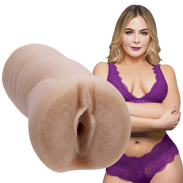 Blair Williams looks into the camera while wearing lingerie. The Signature Strokers Blair Williams stroker is shown next to the porn star. | Kinkly Shop