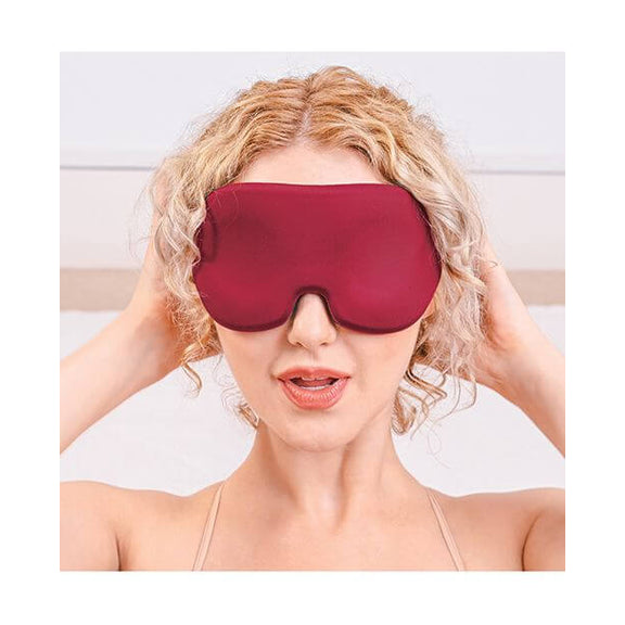 A person wears the Sportsheets Saffron Blackout Blindfold. It takes up a lot of space on the person's face, showcasing how width and tall the blindfold is to block out all light. | Kinkly Shop