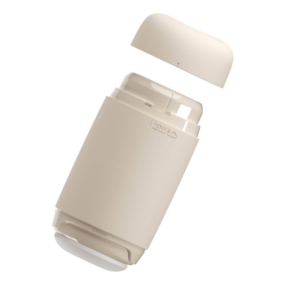 Tenga Puffy shown with one lid removed and the other in the process of being removed, showcasing how the Tenga Puffy has two different lids to remove. | Kinkly Shop