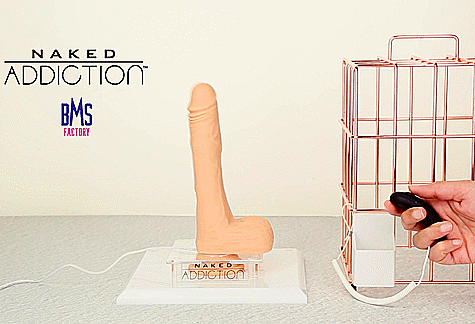 GIF shows the rotation, vibration, and twirl all activated at once making for a really wild movement as the The Freak 7.5": Rotating, Thrusting, and Vibrating is suction cupped to the base underneath it.