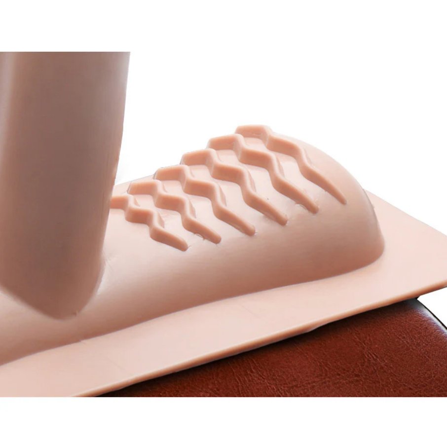 Close-up of the ribbed texture on the base of the The Saddle Sex Machine default attachment. | Kinkly Shop