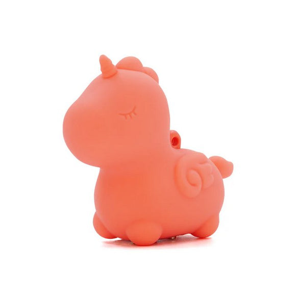 Unihorns Mini Peachy Pony in front of a plain white background | Kinkly Shop