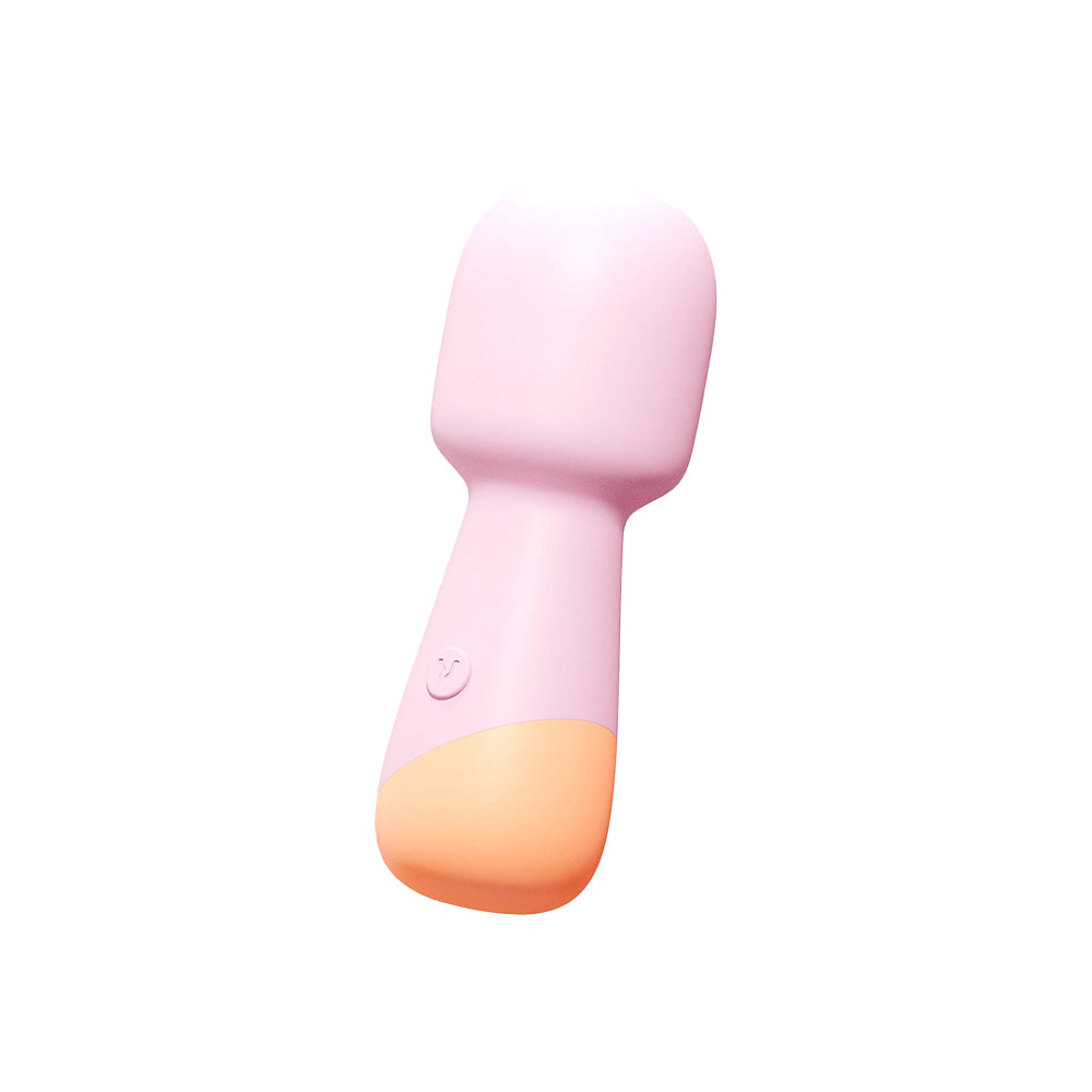 VUSH Peachy Mini Wand in front of a plain white background | Kinkly