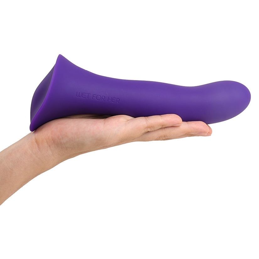 A palm is held flat while a Wet for Her Fusion 2.0 with Grinding Base is resting on top of it. The dildo looks noticeably longer than the person's hand. This is the Large size. | Kinkly Shop