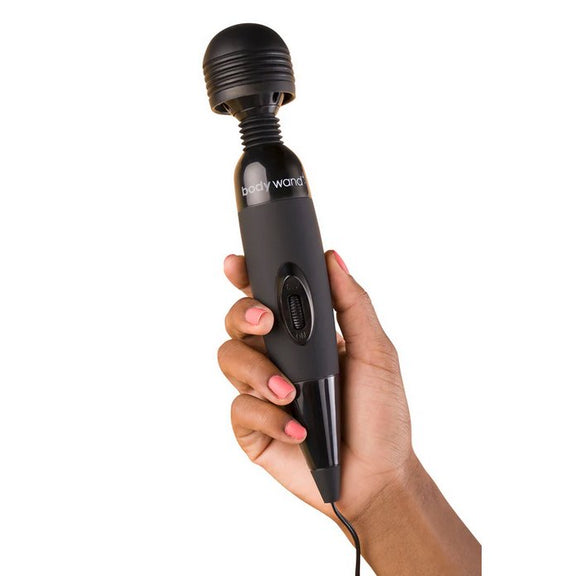 A hand holds the Bodywand Midnight. It looks particularly long in the hand, longer than a standard microphone at a speaking event. | Kinkly Shop