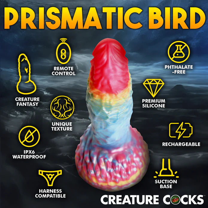 The Creature Cocks Phoenix Vibrating Remote-Control Dildo shown with various icons and text descriptions surrounding it. Text reads: Prismatic bird. Remote control. Creature fantasy. Unique texture. IPX6 waterproof. Harness compatible. Phthalate-free. Premium silicone. Rechargeable. Suction base. | Kinkly Shop