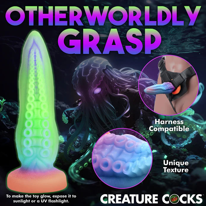 Collage of images showcasing features of the Creature Cocks Tenta-Cock. Text reads: "Otherworldly grasp. Harness compatible. Unique texture. To make the toy glow, expose it to sunlight.| KInkly Shop