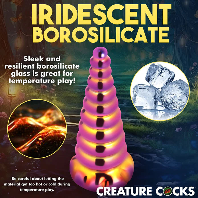 A feature image showcasing a feature of the Creature Cocks Twilight. Text reads: "Iridescent borosilicate. Sleek and resilient borosilicate glass is great for temperature play. Be careful about letting the material get too hot or cold during temperature play." | Kinkly