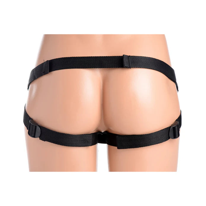 Backside of the Double G Vibrating Strap-On Kit on a mannequin wearing the harness. The harness has a dual-strap design with two straps that each run underneath the butt cheeks on the back. | Kinkly