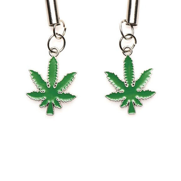 Close-up of the Mary Jane charms dangling on the base of each one of the nipple clamps. They look like enamel charms. | Kinkly Shop