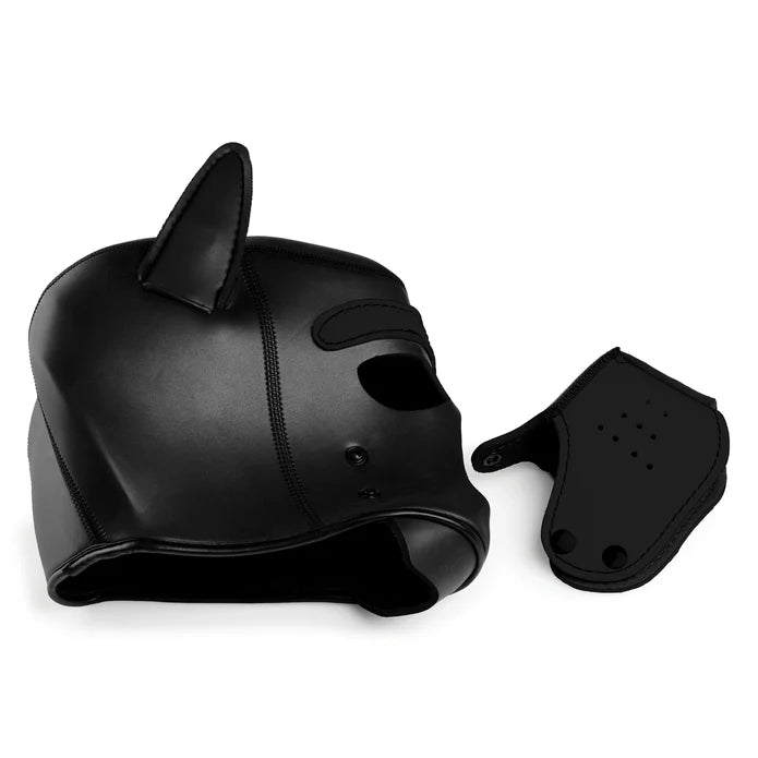 The Master Series Spike Puppy Hood shown laying down with the snout/muzzle removed from the hood. | Kinkly
