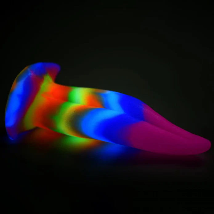 The Creature Cocks Unicorn Kiss in the dark. All of the dildo glows in the darkness from its glow-in-the-dark design. | Kinkly Shop