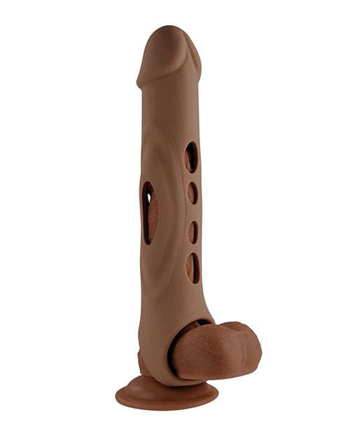 The Evolved Big Shaft Extender in Espresso shown on top of a dildo. The extender adds a lot of length to the dildo underneath it. Through the peekaboo holes, the dildo underneath the extender can still be seen. | Kinkly Shop