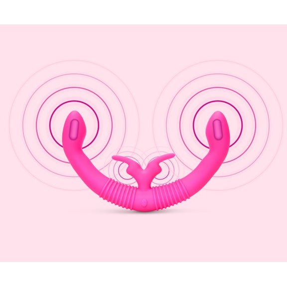 X-Ray image shows the vibration motor locations on the Together Toy Shared Vibrator for Couples. There's one motor in each side of the insertable shafts and one motor that's shared between both flutter vibrators in the middle. | Kinkly Shop