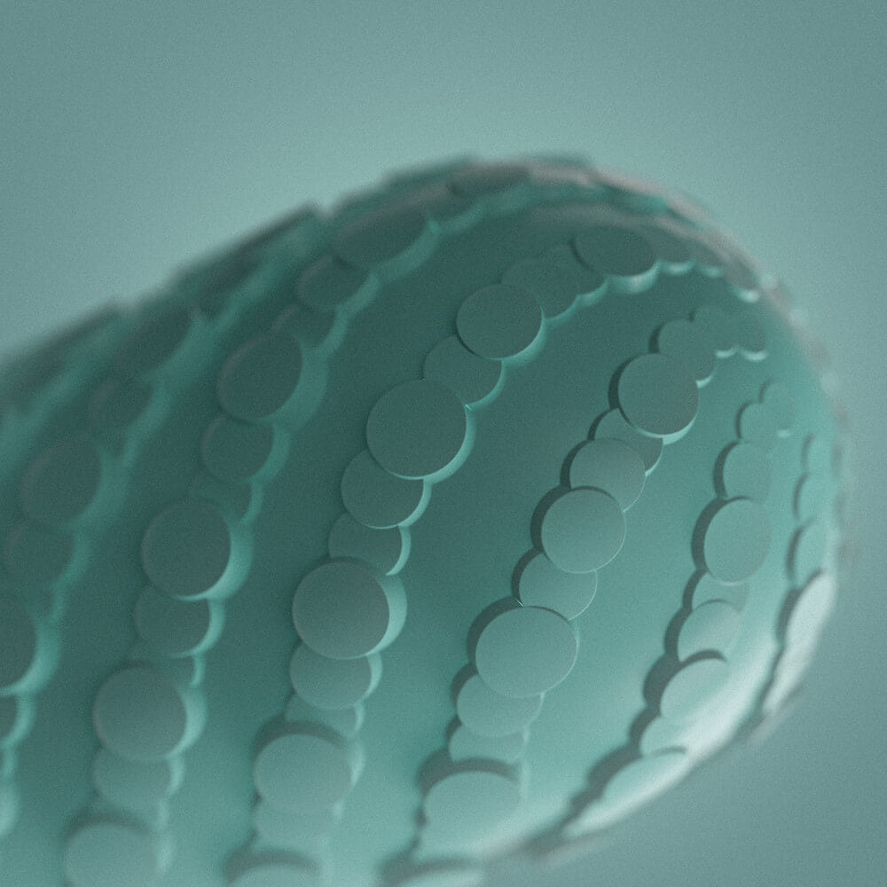 Close-up of the unique, circular, noduled texture. The circles overlap with one another and run in diagonal trails along the full surface of the stroker. They also vary in thickness and in protrusion for an intense texture. | Kinkly Shop