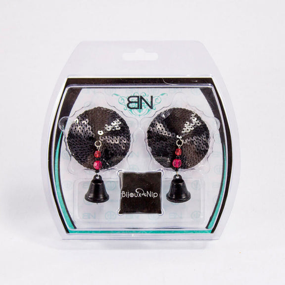The packaging for the Bijoux de Nip Sequin Pasties with Bells. They come in completely plastic, blister-pack packaging. With careful care, this could be resealed to storage the pasties. | Kinkly Shop