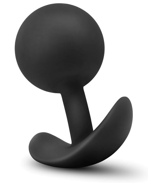 3/4ths view of the Blush Luxe Vibra Round Butt Plug shows the T-shaped base along with the very-round design of the Blush Luxe Vibra Round Butt Plug. It looks like a ball attached to a butt plug base. | Kinkly Shop