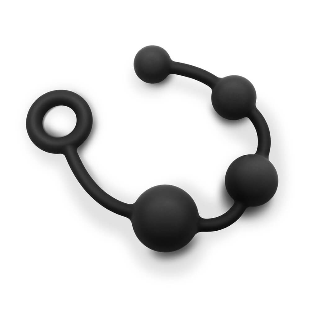 Anal beads included in the b-Vibe mASSter's Degree Anal Set set up against a white, plain background. They look very thick compared to standard anal beads. | Kinkly Shop