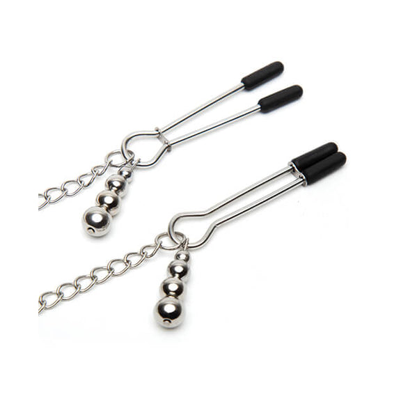 Close-up of the nipple clamps. One clamp is fully open while the other clamp of the "Play Nice" Satin Collar with Nipple Clamps is fully closed. Each clamp also has a small, four-ball charm that drapes off of it. | Kinkly Shop