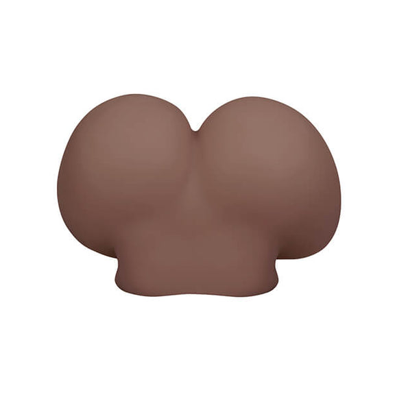 A top-down view of the Gender X A Handful as it sits on a surface. This showcases the very large, bubble-butt appearance of the backside as well as the spot on the torso where the mini sex doll stops. | Kinkly Shop