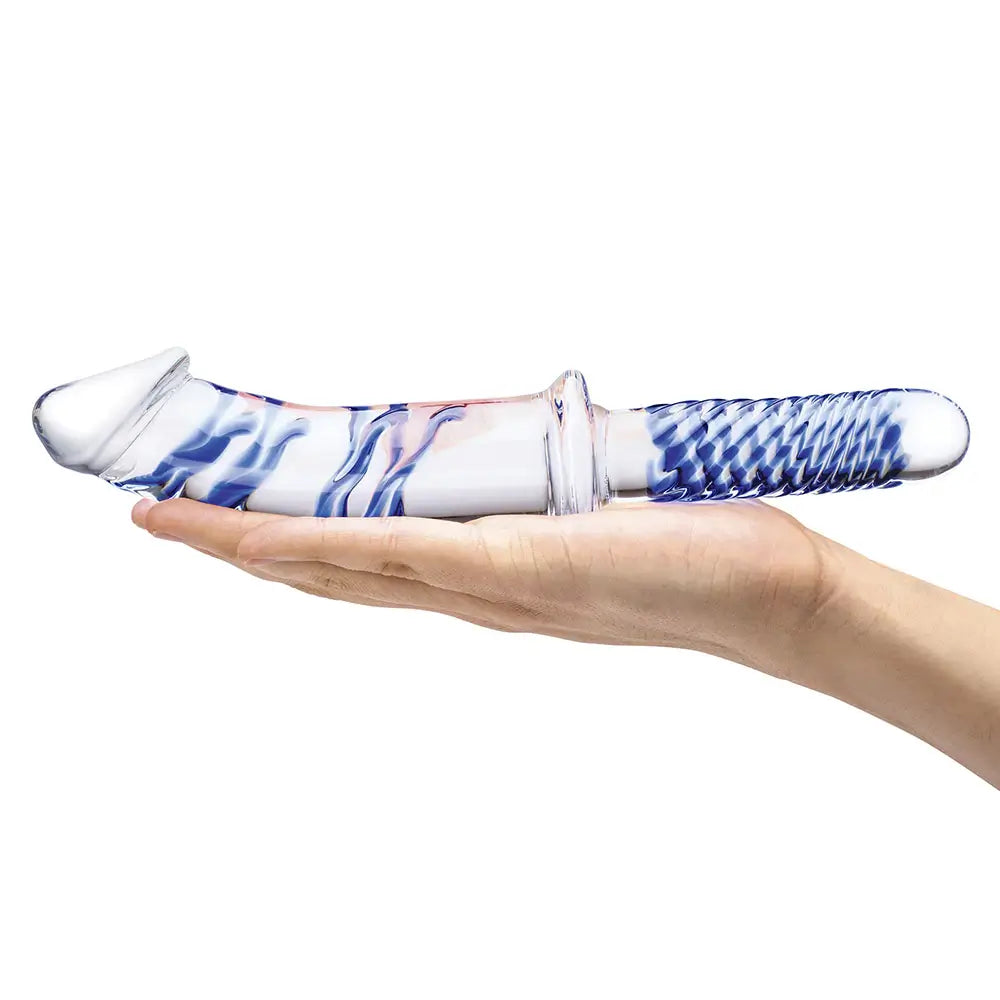 A flat palm holds the Glas Realistic Dildo with Handle Glass Dildo. The dildo is much, much longer than the flattened palm, and the insertable dildo half of the dildo is much longer in length than the handle. The blue color pops against the semi-translucent glass. | Kinkly Shop
