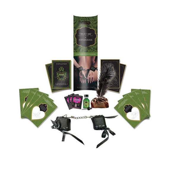 Everything included within the Kama Sutra Trust Me Erotic Playset laid out against a white background. | Kinkly Shop