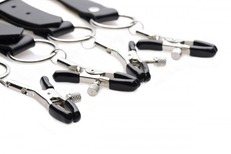 Close-up of the clamps on the Master Series Labia Spreader with Clamps which shows the rubber tip clamps with adjustable labia clamp design | Kinkly Shop